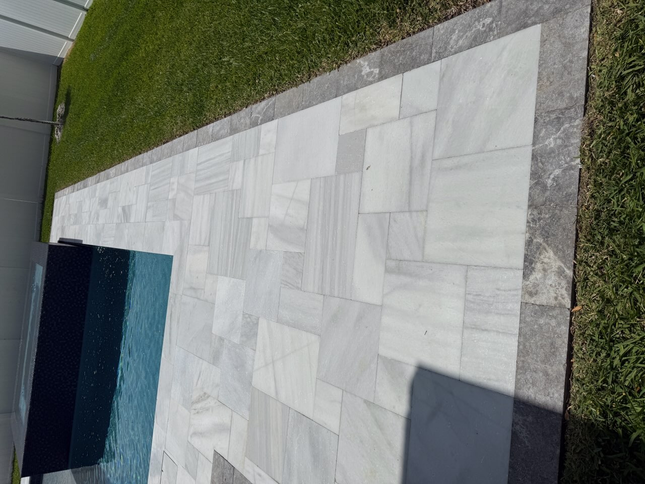Sealed travertine pool deck completed by Clean 'n Seal of Tampa